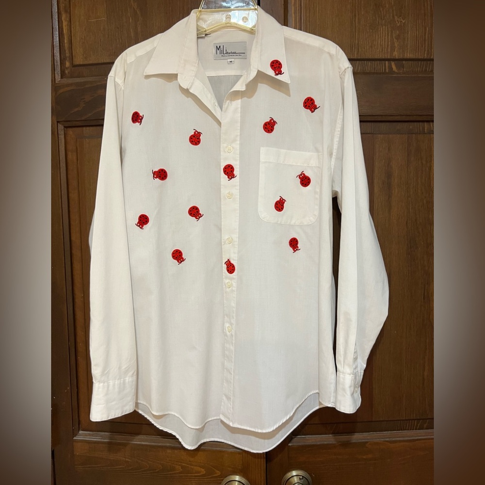 Size medium white button down shirt with lady big appliqué red ladybugs